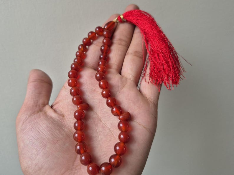 Natural red aqeeq tasbih , red agate tasbih , 33 beads agate tasbih , rosary beads , agate rosary , agate prayer beads , red carnelian agate prayer beads , natural yemeni aqeeq tasbih , Islamic agate tasbih , 33 beads tasbih , red agate tasbih , gifts for Muslim,  yemeni aqeeq tasbih , agate prayer beads , rosary beads , Muslim prayer beads , Islamic prayer beads , round aqeeq beads tasbih , agate beads tasbih , gifts for Muslim friends , Islamic gifts,  Islamic aqeeq tasbih ,rosary beads ,beads