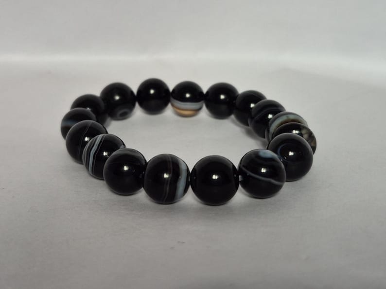 Black Agate beads, round aqeeq Bracelet ,suleimani aqeeq Bracelet , Bracelet , black agate , agate beads , round beads , Islamic necklace, natural aqeeq , Yemeni aqeeq , agate Bracelet , round aqeeq beads , aqeeq natural beads , natural stone , banded agate bracelet,  aqeeq beads bracelet,  round beaded bracelet,  beautiful gifts , best gifts for her , gifts for brother  , gifts for him , casual wear bracelet,  everyday wear bracelet,  aqeeq jewelry, yemeni aqeeq,  aqiq Bracelet, agate Bracelet,