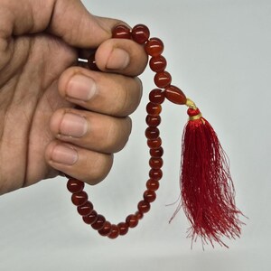 Natural red aqeeq tasbih , red agate tasbih , 33 beads agate tasbih , rosary beads , agate rosary , agate prayer beads , red carnelian agate prayer beads , natural yemeni aqeeq tasbih , Islamic agate tasbih , 33 beads tasbih , red agate tasbih , gifts for Muslim,  yemeni aqeeq tasbih , agate prayer beads , rosary beads , Muslim prayer beads , Islamic prayer beads , round aqeeq beads tasbih , agate beads tasbih , gifts for Muslim friends , Islamic gifts,  Islamic aqeeq tasbih ,rosary beads ,beads