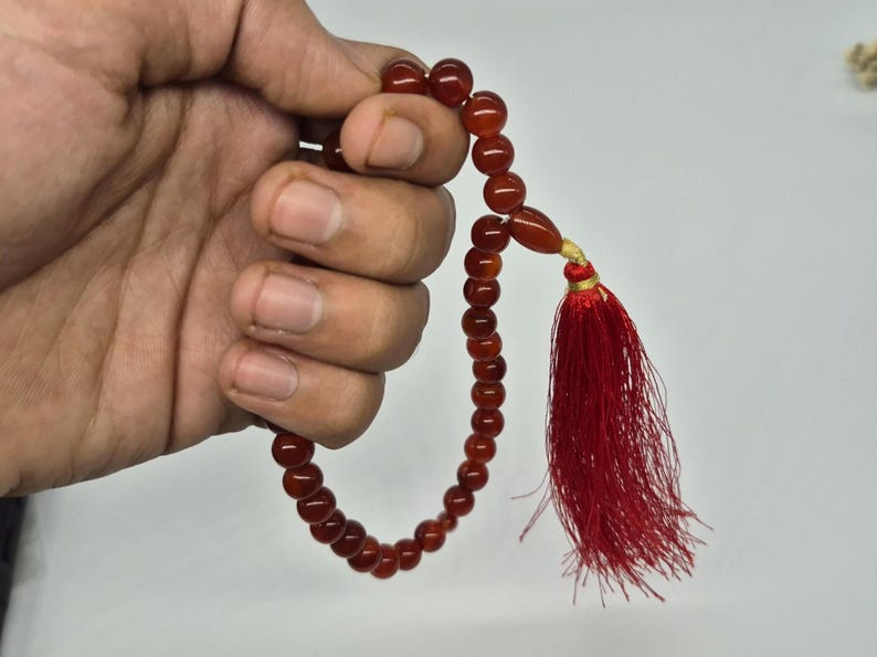 Natural red aqeeq tasbih , red agate tasbih , 33 beads agate tasbih , rosary beads , agate rosary , agate prayer beads , red carnelian agate prayer beads , natural yemeni aqeeq tasbih , Islamic agate tasbih , 33 beads tasbih , red agate tasbih , gifts for Muslim,  yemeni aqeeq tasbih , agate prayer beads , rosary beads , Muslim prayer beads , Islamic prayer beads , round aqeeq beads tasbih , agate beads tasbih , gifts for Muslim friends , Islamic gifts,  Islamic aqeeq tasbih ,rosary beads ,beads