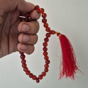 Natural red aqeeq tasbih , red agate tasbih , 33 beads agate tasbih , rosary beads , agate rosary , agate prayer beads , red carnelian agate prayer beads , natural yemeni aqeeq tasbih , Islamic agate tasbih , 33 beads tasbih , red agate tasbih , gifts for Muslim,  yemeni aqeeq tasbih , agate prayer beads , rosary beads , Muslim prayer beads , Islamic prayer beads , round aqeeq beads tasbih , agate beads tasbih , gifts for Muslim friends , Islamic gifts,  Islamic aqeeq tasbih ,rosary beads ,beads