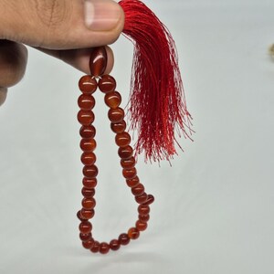 Natural red aqeeq tasbih , red agate tasbih , 33 beads agate tasbih , rosary beads , agate rosary , agate prayer beads , red carnelian agate prayer beads , natural yemeni aqeeq tasbih , Islamic agate tasbih , 33 beads tasbih , red agate tasbih , gifts for Muslim,  yemeni aqeeq tasbih , agate prayer beads , rosary beads , Muslim prayer beads , Islamic prayer beads , round aqeeq beads tasbih , agate beads tasbih , gifts for Muslim friends , Islamic gifts,  Islamic aqeeq tasbih ,rosary beads ,beads