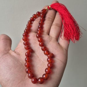 Natural red aqeeq tasbih , red agate tasbih , 33 beads agate tasbih , rosary beads , agate rosary , agate prayer beads , red carnelian agate prayer beads , natural yemeni aqeeq tasbih , Islamic agate tasbih , 33 beads tasbih , red agate tasbih , gifts for Muslim,  yemeni aqeeq tasbih , agate prayer beads , rosary beads , Muslim prayer beads , Islamic prayer beads , round aqeeq beads tasbih , agate beads tasbih , gifts for Muslim friends , Islamic gifts,  Islamic aqeeq tasbih ,rosary beads ,beads