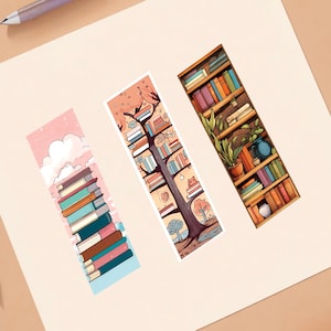 May include: Three illustrated bookmarks featuring different book-themed designs. The first bookmark features a stack of colorful books against a pink and blue sky with clouds. The second bookmark features a tree with books as leaves and a cat sitting on a book. The third bookmark features a bookshelf filled with books and plants.