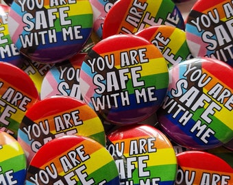 Bulk pack you are safe with me pin badges. 1.25 inches (32mm) Diameter. LGBTQ support pin for schools or clubs. Progress flag. Pride ally.