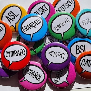 Bulk language pins button badges. Francais, espanol, cymraeg. Your choice of languages. I speak badges pins
