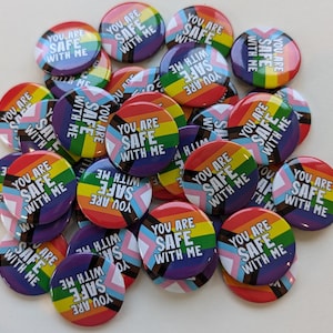 Bulk pack you are safe with me pin badges. 1.25 inches (32mm) Diameter. LGBTQ support pin for schools or clubs. Progress flag. Pride ally.