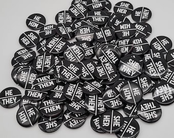 Bulk pack of 105 mixed pronoun pins. 25mm / 1 inch mini pins. Black and white