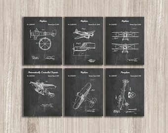 May include: Set of six vintage airplane patent prints in black and white on a chalkboard background. Each print features a different airplane design with patent information, including the patent number, date, and inventor's name.