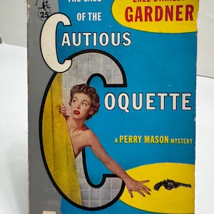 May include: Vintage paperback book cover for "The Case of the Cautious Coquette" by Erle Stanley Gardner. The cover features a woman behind a yellow towel, with a gun illustration and text in blue, yellow, and white.