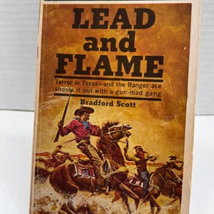 May include: Vintage paperback book cover for "Lead and Flame" by Bradford Scott. The cover features a cowboy on horseback, holding a rifle, with other riders in a desert scene. The title is in large, bold letters, with the author's name below.