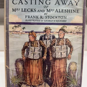 May include: Vintage book cover titled "The Casting Away of Mrs. Lecks and Mrs. Aleshine" by Frank R. Stockton. The illustration depicts three people on a pier, with a coastal background. The cover has a purple border and shows signs of wear.