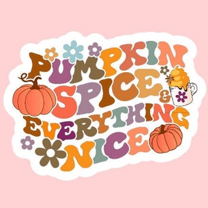 May include: A white sticker with a colorful retro font design that says "Pumpkin Spice Everything Nice". The sticker features two pumpkins and a cup of coffee with whipped cream.