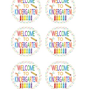 May include: Four colorful welcome to kindergarten signs with a pencil, scissors, and crayons. The signs are perfect for a classroom or a party.