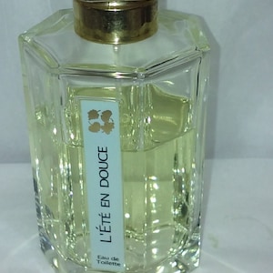 L 'artisan L’Ete en Douce eau de toilette 70 % full 3.4 oz read