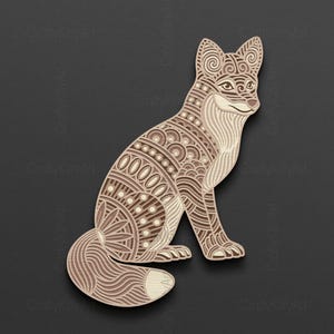 May include: A detailed, intricate, laser-cut wooden fox figurine with a brown and cream colour scheme. The fox is sitting with its tail curled around its body.