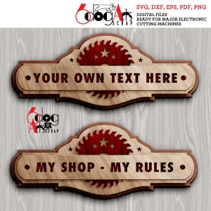 May include: Two wooden signs with a saw blade design in the center. The top sign says "YOUR OWN TEXT HERE." The bottom sign says "MY SHOP - MY RULES."