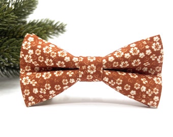 Nœud papillon floral orange brûlé : mariage, porteur d'alliances, marié