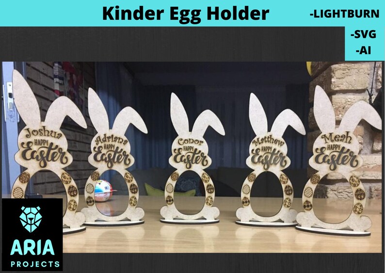 May include: Five wooden bunny-shaped Kinder egg holders with personalized names and the text "Happy Easter".