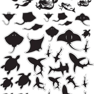 May include: Black silhouette cutouts of mermaids, stingrays, turtles, and sharks on a white background. The image includes the text "Allstaresin Studio" and a logo. These cutouts are likely for crafting or decorative purposes.