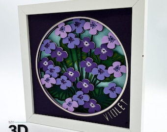 May include: A white frame with a purple background and a circle in the center. The circle contains a 3D paper cut design of purple flowers with green leaves. The text "VIOLET" is written in white at the bottom of the circle.