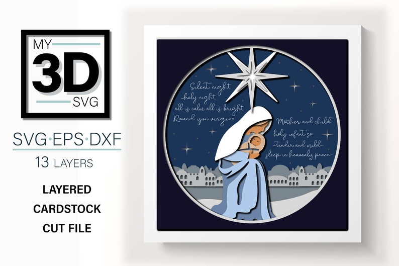 May include: A layered papercraft design of the nativity scene with Mary holding baby Jesus. The design features a blue and white color scheme with a silver star and the text "Silent night holy night all is calm all is bright Round you virgin Mother and child holy infant so tender and mild sleep in heavenly peace".