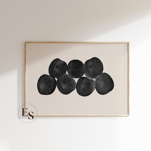 May include: A digital art print featuring a cluster of seven black circles, resembling fruit, arranged in a semi-circle on a beige background.