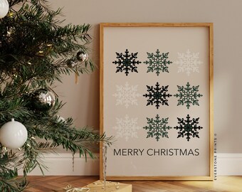 Könnte beinhalten: Ein druckbarer Kunstdruck mit einem minimalistischen Design aus neun Schneeflocken in Grün- und Weißtönen. Der Druck trägt den Text "Merry Christmas" am unteren Rand.