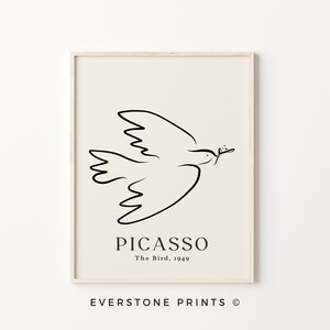 May include: Black and white line art print of a dove carrying an olive branch. The print has the text "PICASSO The Bird, 1949" below the image.