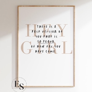 May include: A motivational quote in a brown font on a white background in a wooden frame. The quote reads "There is a past version of you that is so proud of how far you have come."