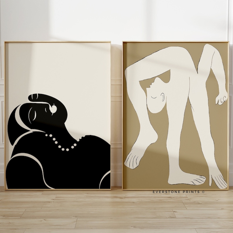 May include: Two minimalist line art prints featuring abstract figures. The print on the left is black on a white background. The print on the right is white on a beige background. The text "EVERSTONE PRINTS &copy;" is at the bottom of the print on the right.