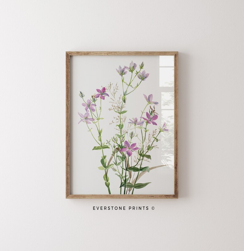 May include: A framed watercolor painting of a bouquet of delicate purple wildflowers with green stems and leaves on a white background. The text "EVERSTONE PRINTS &copy;" is at the bottom of the image.