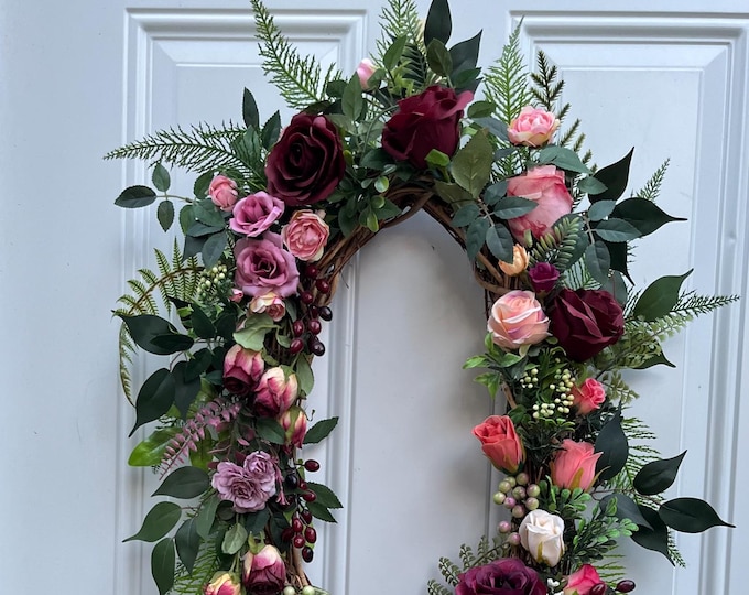 Year round English cottage vintage wreath, oval shape 24" inch height/ 16" inch wide/ natural grapevine base/Handcrafted quality materials.