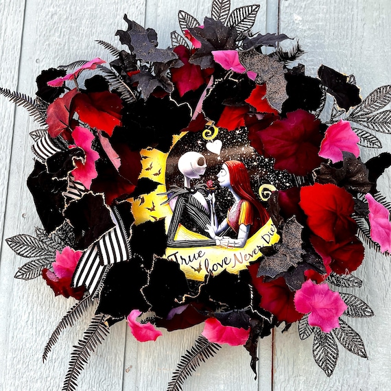 Wreath Nightmare before Christmas sign inside natural grapevine wreath velvet and glitter leaves with wired edge bow.
