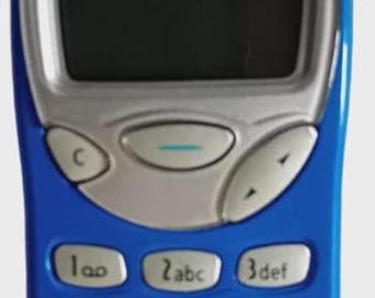 Teléfono móvil antiguo Nokia 3210