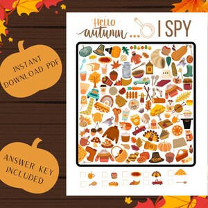 Könnte beinhalten: Ein druckbares "Ich sehe was, was du nicht siehst"-Spiel mit Herbstthema. Das Spiel zeigt ein Raster mit bunten Illustrationen von Herbstobjekten, darunter Kürbisse, Blätter, Eicheln und ein Truthahn. Der Text "Hello autumn... I SPY" steht oben auf der Seite. Unten auf der Seite befinden sich leere Kästchen, in die die Spieler die gefundenen Gegenstände abhaken können.