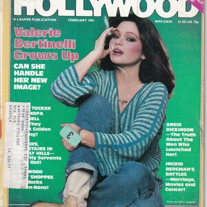 May include: A magazine cover featuring a woman with long brown hair wearing a blue and white striped sweater and blue jeans. The magazine is titled "Rona Barrett's Hollywood" and the cover story is about Valerie Bertinelli. The cover also features articles about Angie Dickinson and Ingrid Bergman.