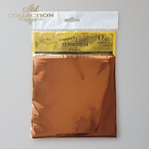 May include: A package of copper foil sheets labeled "TERMOTON" with "5 sheets" visible. The foil has a shiny, metallic copper color. The packaging includes the text "Itd. COLLECTION" and "Our passion PAPER".