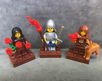 3 Saints in Lego (St. Therese, St. Joan of Arc, St Francis of Assisi)