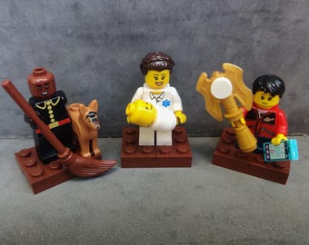 3 Saints in Lego (St Carlo Acutis, St. Gianna Molla, and St. Martin de Porres)