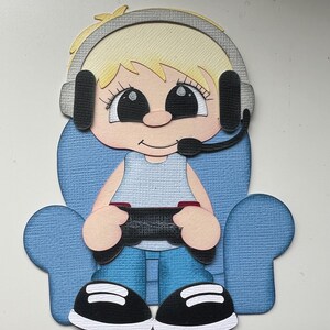 Gamer boy blonde  die cut paper pieced for your scrapbook layouts or cards.
