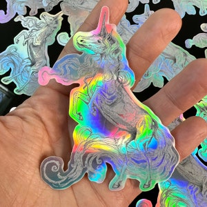 Autocollant holographique poétique de licorne