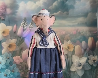 Elephant-sailor, vintage-style art doll, interior textile figurine on a stand.