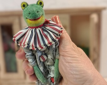 The Harlequin Frog is a textile doll in vintage style. An interior toy, decoration on a shelf or can be hung on the wall.