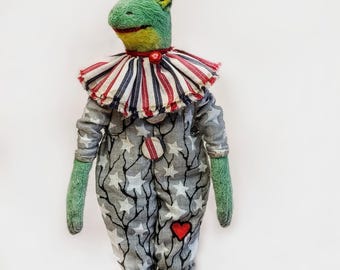 Frog Prince in a star-studded jumpsuit and crown, vintage-style textile doll, miniature on a stand