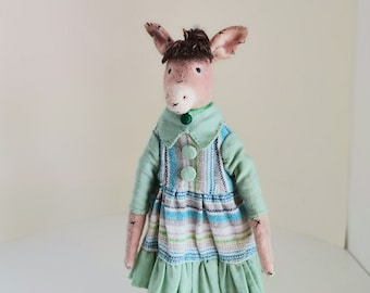 Doll Donkey girl textile interior toy on a stand, vintage style doll.
