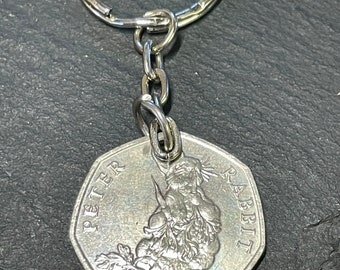 Peter Rabbit eating carrot 50p Keyring great for coin collector Peter Rabbit series