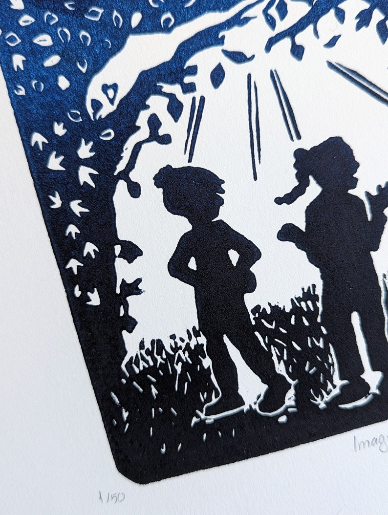 May include: A blue and white linocut print of two figures standing in a forest. The figures are silhouetted against a white background with a tree and sun rays above them. The print is numbered 1/150.