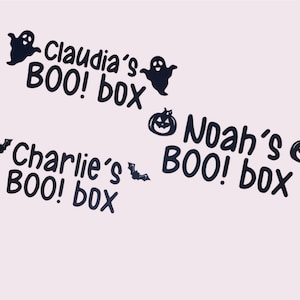 May include: Three Halloween-themed treat boxes with black and white graphics. The boxes are labeled "Claudia's BOO! box", "Charlie's BOO! box", and "Noah's BOO! box".