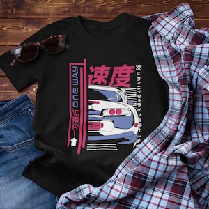 May include: Black t-shirt with a white and blue car graphic, Japanese text, and the words "One Way" in pink. The text reads "一方向通行", "深夜", and "次にご利用する際は、".